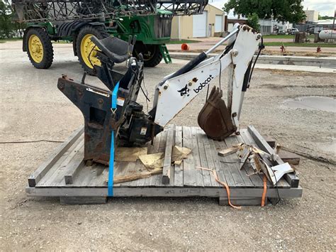 model 709 backhoe attachment for a bobcat skid steer|bobcat 709 backhoe attachment video.